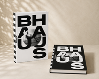 Bauhaus Grey decorative book stacked with white minimal book on shelf