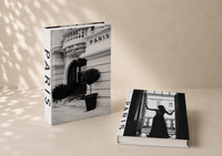 Amsterdam decorative book styled on console table with candle and stone